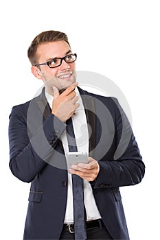 Businessman holding a cellphone, grinning and look up