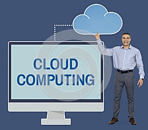 Businessman holding cloud computing icon