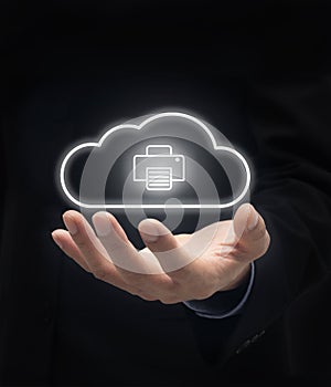 Businessman holding a cloud connected print icon Cloud printing Concept