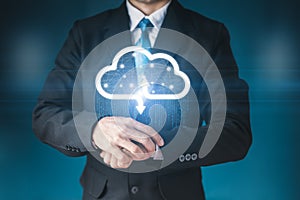 Businessman holding a cloud data icon with light and the binary number 1010. The concept of digital traffic is connected to the cl