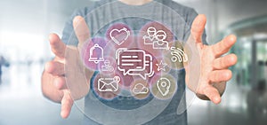 Businessman holding a cloud of social media network icon