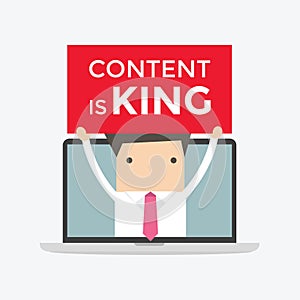 Businessman holding Content is King sign in computer notebook