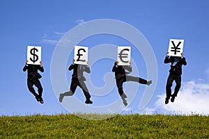 Businessman holding currency signs