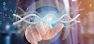Businessman holding a 3d rendering data coded Dna with binary file around