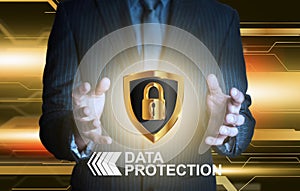 Businessman holding data protection shield