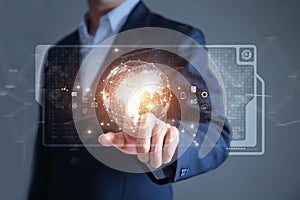 Businessman holding digital datas with world interface with finger