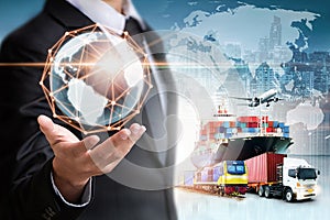 Businessman holding digital globe in palm for logistics import export background and container cargo freight ship transport