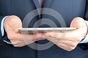 Businessman holding a digital tablet