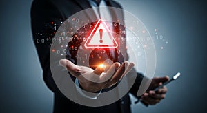 Businessman holding digital warning sign with binary code and da