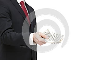 Businessman holding dollars