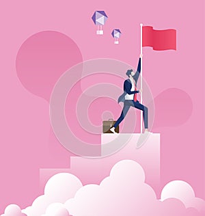 Businessman holding a flag on top of the column graph