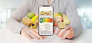 Businessman holding a food mobile app - 3d rendering