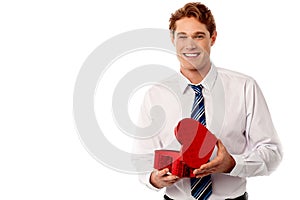 Businessman holding gift box