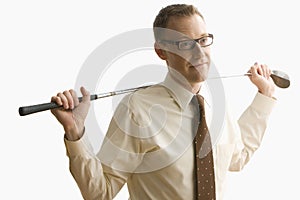 Businessman Holding Golf Club - Isolated