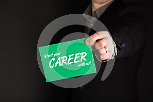 Businessman holding green card with text Start Your Career With Us!