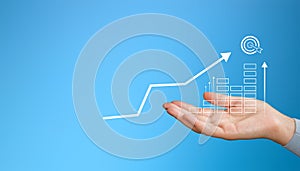 Businessman holding growing graph. Business growth and profit performance. Customer satisfaction concept