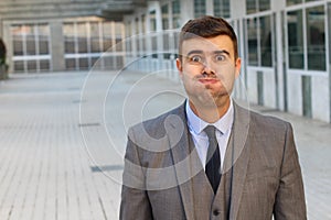 Businessman holding his breath with copy space