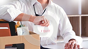 Businessman holding with I quit words card letter, resign employee Change of job concept