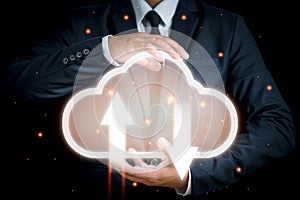 Businessman holding icon cloud computing network and data information
