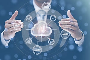 Businessman holding icon cloud computing network and group people icon, Cloud computing and technology concept