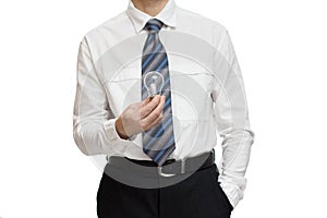 Businessman holding light bulb