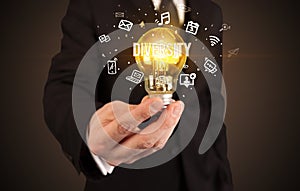 Businessman holding a light bulb, social media concept