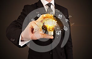 Businessman holding a light bulb, social media concept