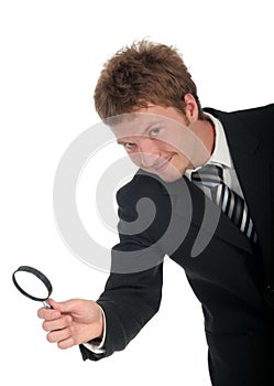 Businessman Holding Magnifying Glass