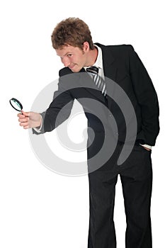 Businessman Holding Magnifying Glass