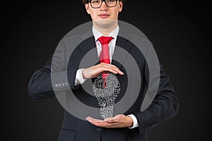 Businessman holding maze