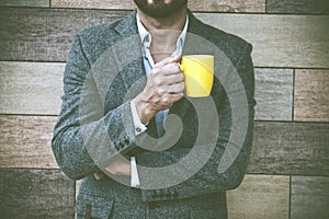 businessman holding morning coffee