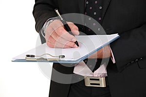 Businessman holding a notepad