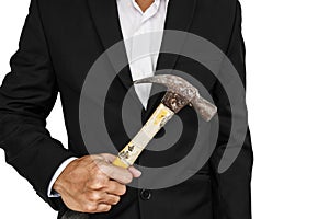 Businessman holding old hammer, isolated on white background