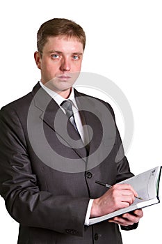 Businessman holding a pen requesting a signature on a document