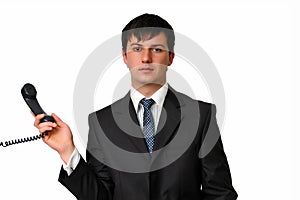 Businessman holding a phone receiver