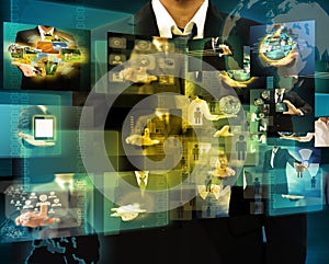 businessman holding Reaching images streaming in hands .Financial and technologies concepts