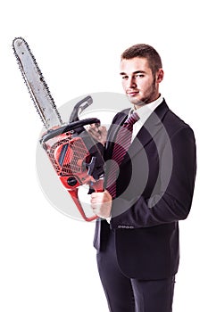 Businessman holding a red chain saw