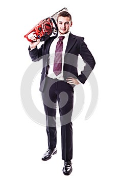 Businessman holding a red chainsaw