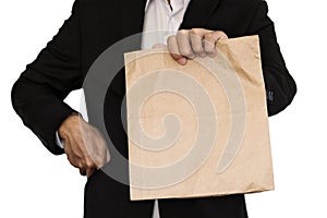 Businessman holding(Sharing,giving) brown paper bag lunch, isolated on white background