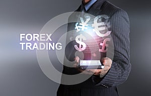 Businessman holding smart phone world of currency forex trading