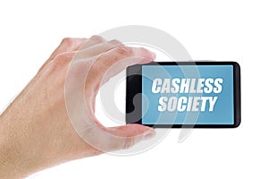 Businessman holding smartphone with Cashless society title