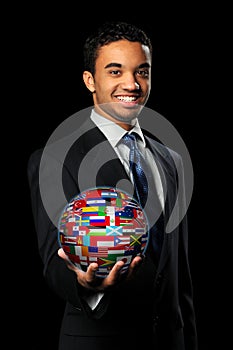 Businessman Holding Sphere With World Flags