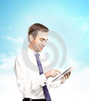 Businessman holding tablet