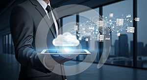 Businessman Holding Tablet with Cloud Computing Network
