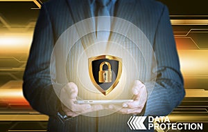 Businessman holding tablet data protection shield