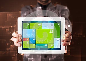 Businessman holding a tablet with modern software operational system