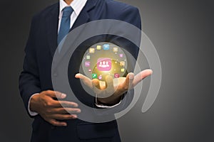 Businessman holding technology icons