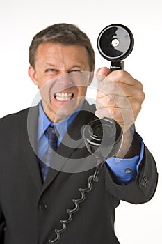 Businessman Holding Telephone