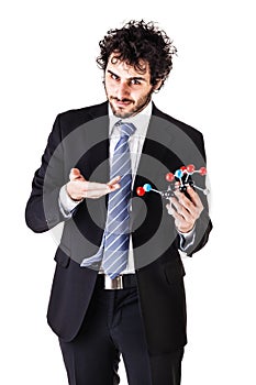 Businessman holding a tnt molecule