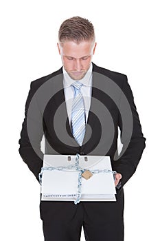 Businessman holding a top secret file